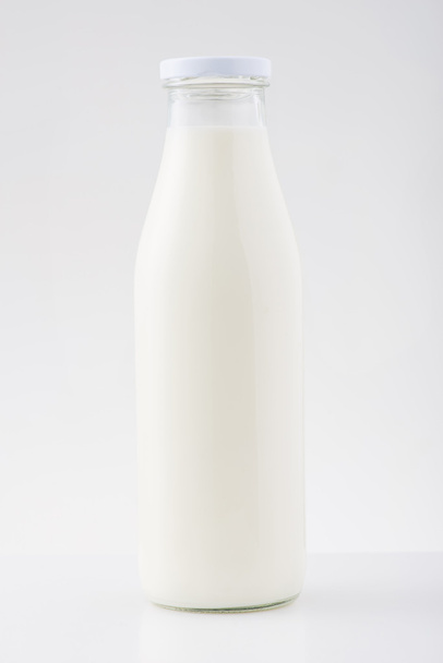 Medium bottle of milk - Фото, изображение