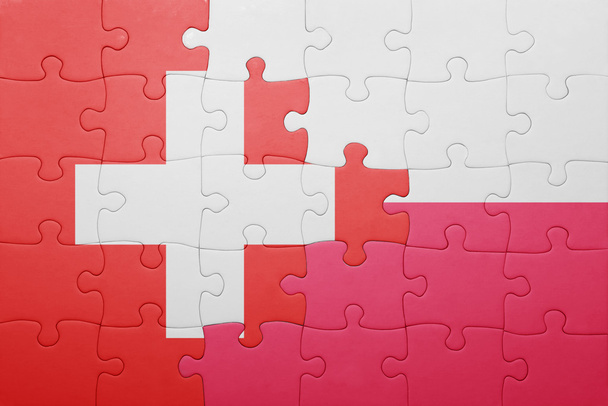puzzle con la bandiera nazionale della Svizzera e della Polonia
 - Foto, immagini