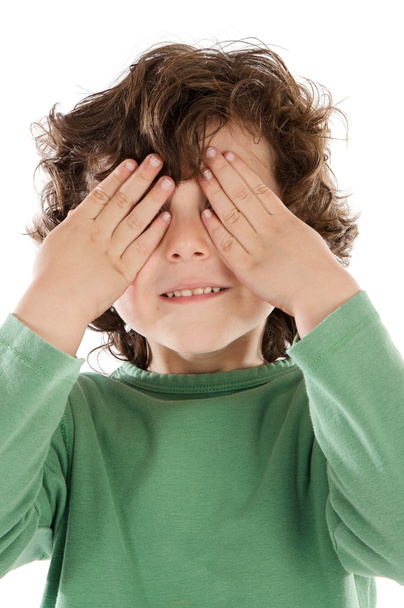 Boy with his hands covering the eyes - Photo, image
