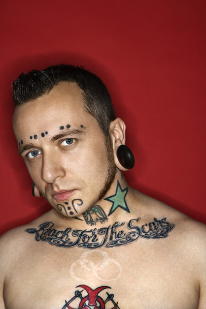 Man with tattoos and piercings. - Fotoğraf, Görsel