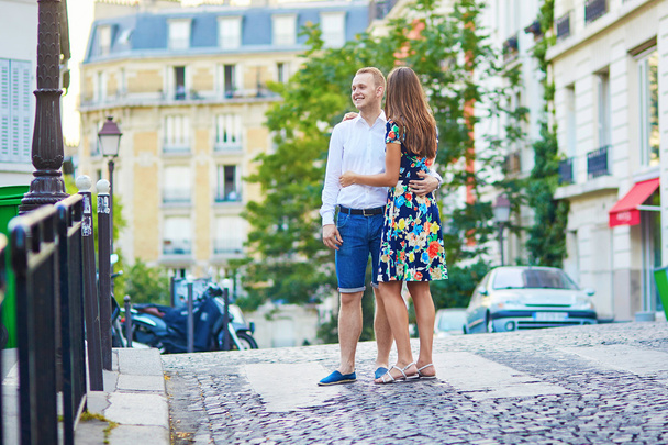 Young romantic couple walking on Montmartre - Photo, Image
