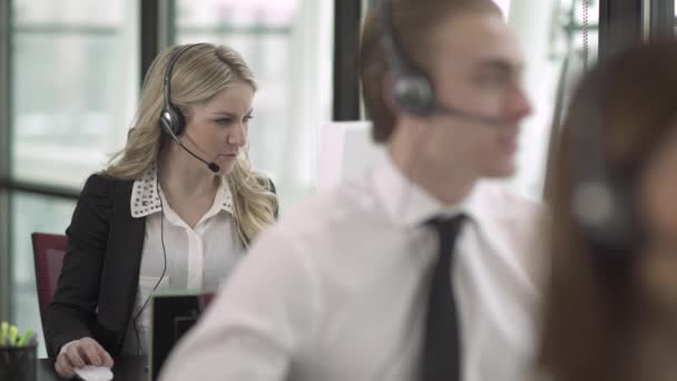 Scene from a customer support or call center - Video, Çekim