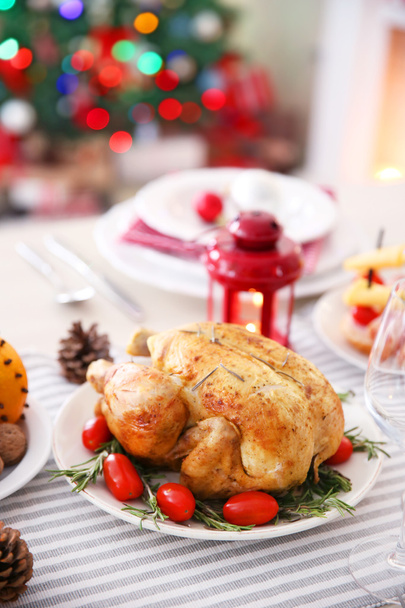 Backed chicken on a Christmas table setting - Fotó, kép