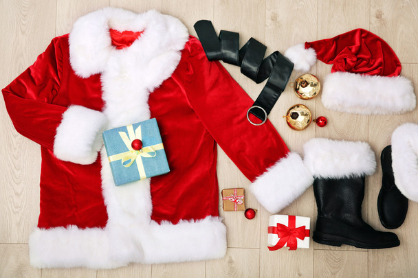 Santa Claus costume on wooden background, close up - Φωτογραφία, εικόνα