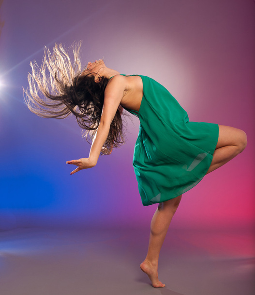 Young brunette caucasian woman dancing - Foto, imagen