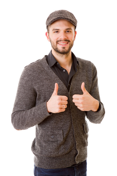 young casual man going thumbs up, isolated on white background - Photo, Image