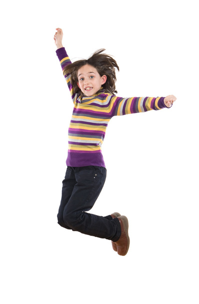 Joyful little girl jumping - Photo, Image