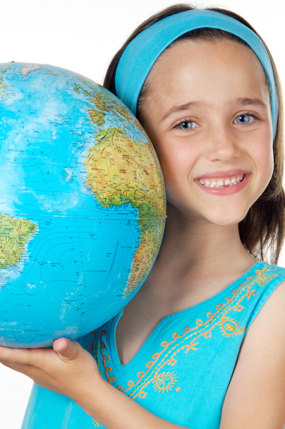 Girl with a globe of the world - Φωτογραφία, εικόνα