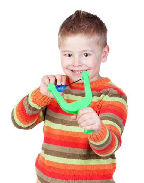 Adorable child with a slingshot - Photo, Image