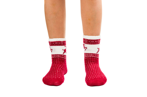 Beine langes Weibchen in gestreiften Socken isoliert  - Foto, Bild