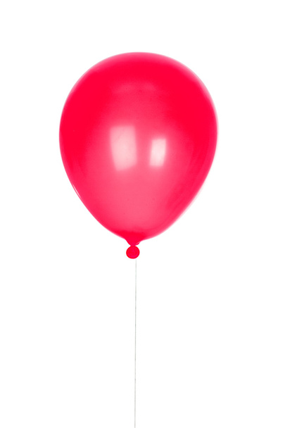 Globo rojo inflado
 - Foto, Imagen