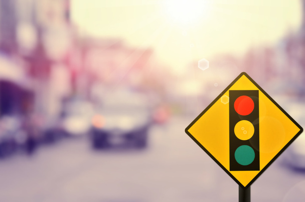 Traffic light sign on blur road background. - Photo, Image