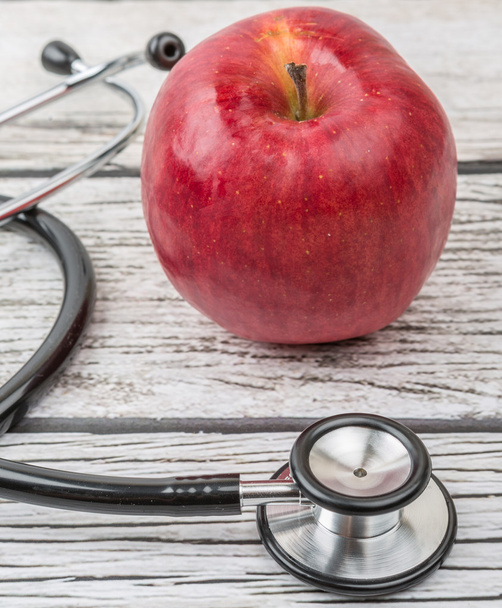 Stethoscope And Apple Fruit - Фото, зображення