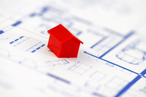 Red model house with architecture plan - Φωτογραφία, εικόνα