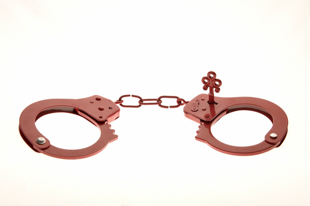 Червоні наручники як секс-іграшка
 - Фото, зображення