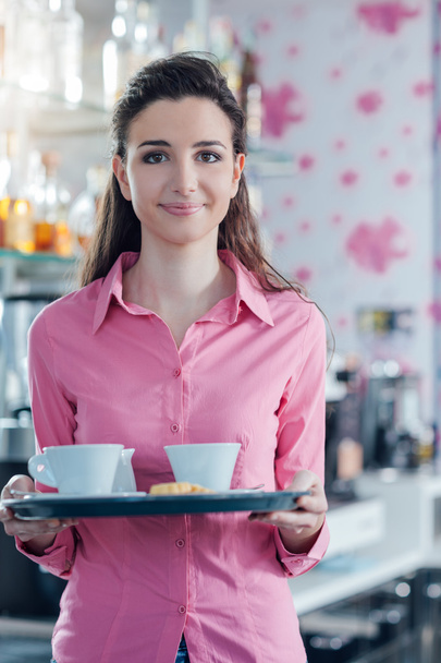 waitress serving coffee - Foto, Bild
