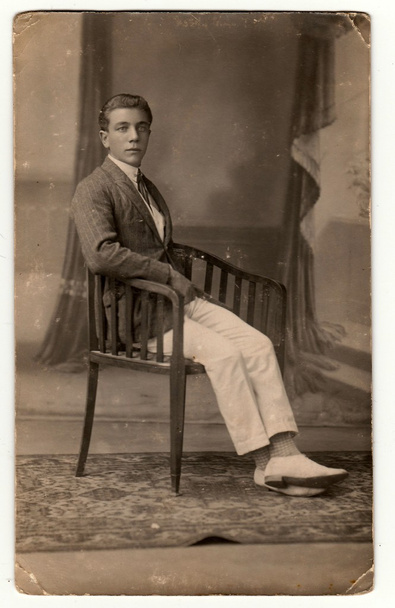 A young man - vintage photo. Photo was taken in photo studio in Hodonin (the Czech Republic). The thirties. - 写真・画像
