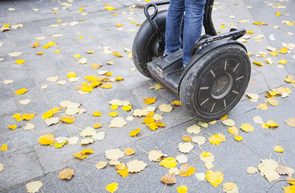 Visitor on segway by the city on autumn - Photo, Image