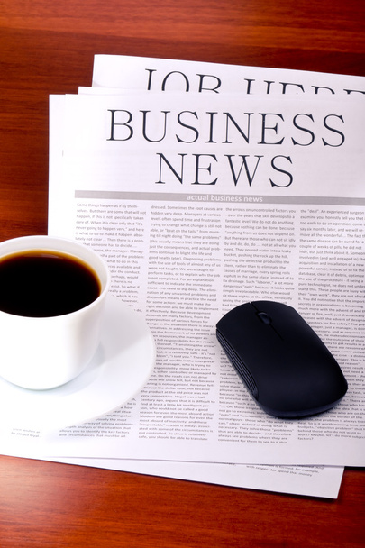 Business newspaper, cup of coffee and mouse - Фото, зображення