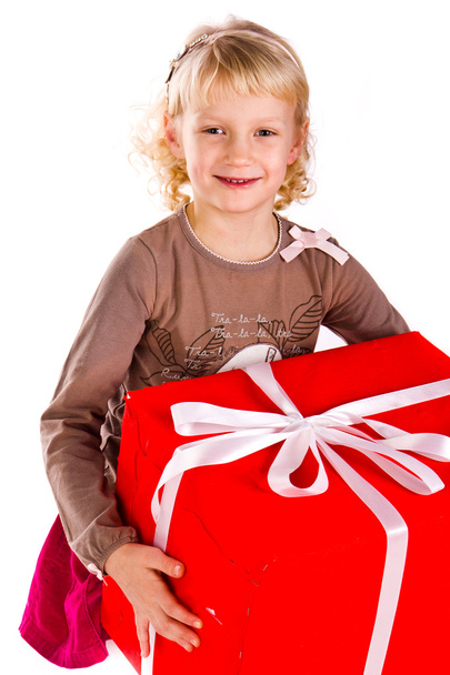 Beautiful little girl with presents - Фото, зображення
