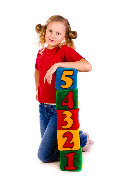 Happy girl holding blocks with numbers - Zdjęcie, obraz