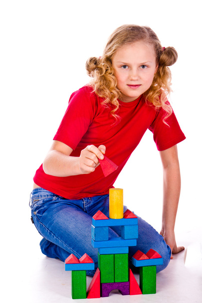 Children building a castle with cubes - Foto, immagini