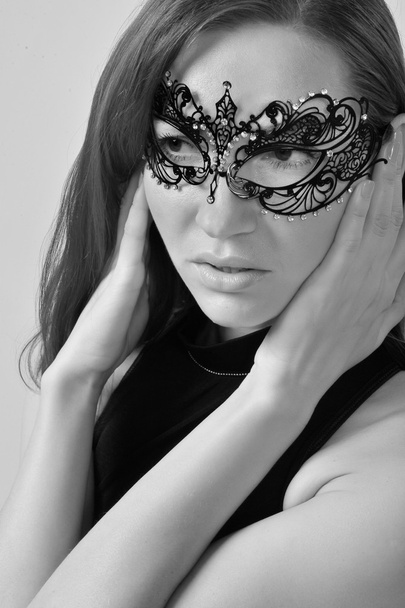 brunette model wearing back mask - Fotó, kép