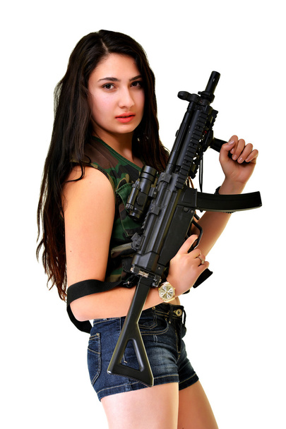 Молода жінка з пістолетом
 - Фото, зображення