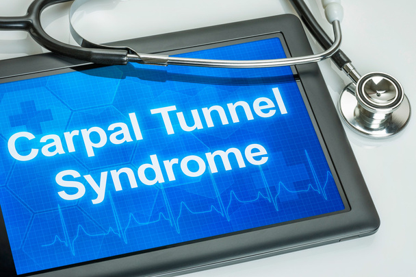 Tablet con la diagnosi Sindrome del tunnel carpale sul display
 - Foto, immagini