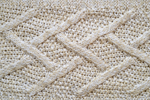 Texture di un tessuto beige lavorato a maglia
 - Foto, immagini