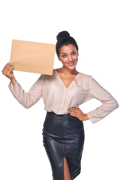 Smiling businesswoman with parcel - Фото, изображение