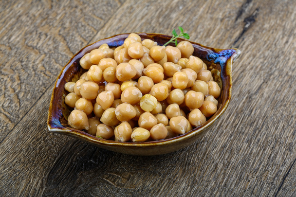 Canned chickpeas in bowl - Photo, Image