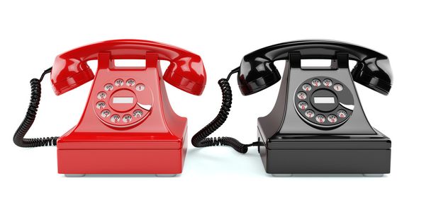 Vörös és fekete, elszigetelt régimódi telefonok - Fotó, kép