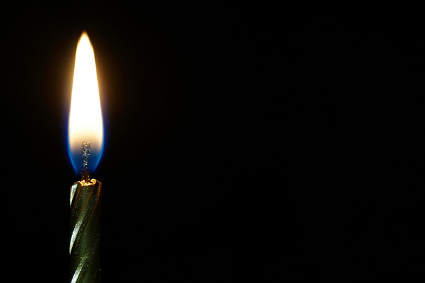 burning candle isolated on black - Foto, immagini