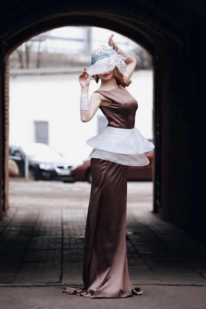 young lady posing in retro dress - Fotoğraf, Görsel