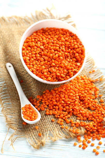 Red lentils in bowl - Фото, изображение