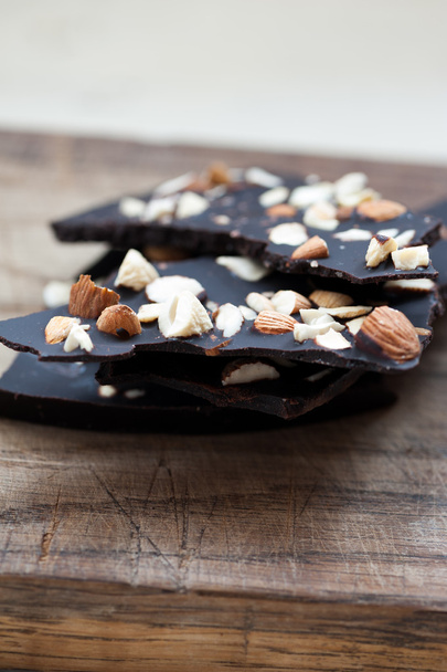 Raw vegan chocolate with nuts - Photo, image