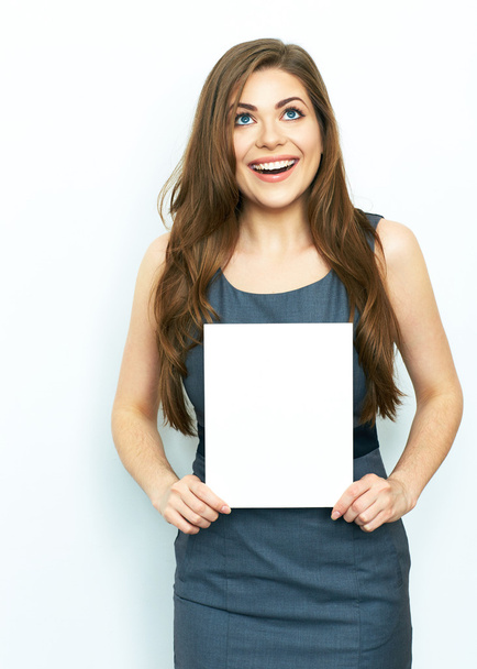 Businesswoman holds blank paper - Фото, изображение