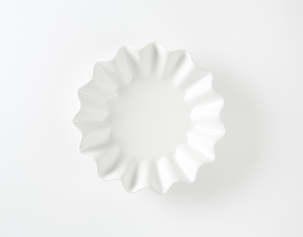 Fluted white bowl - Фото, изображение