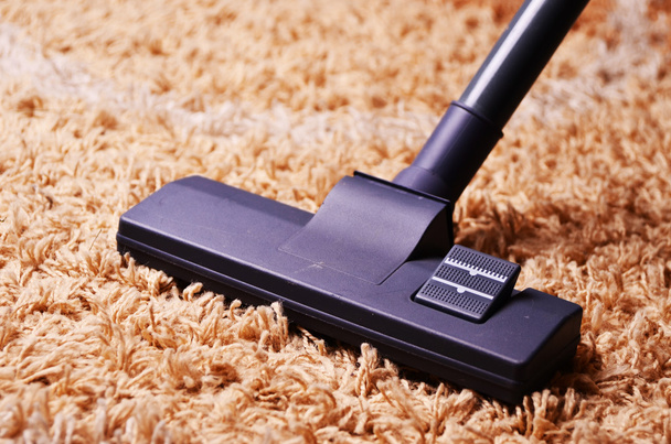 vacuum cleaner on the carpet - Photo, image