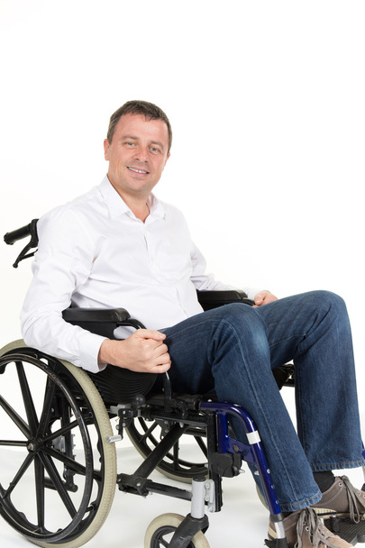 Portrait of charming man in wheelchair. Isolated on white - Φωτογραφία, εικόνα
