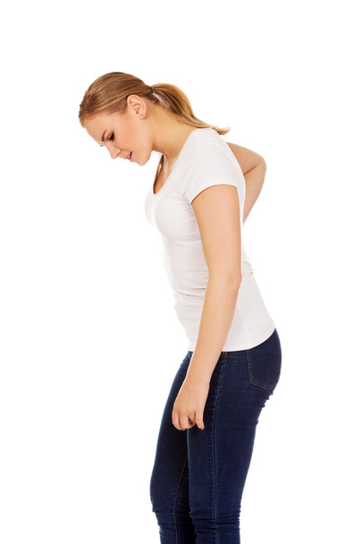 Young woman with back ache - Fotó, kép
