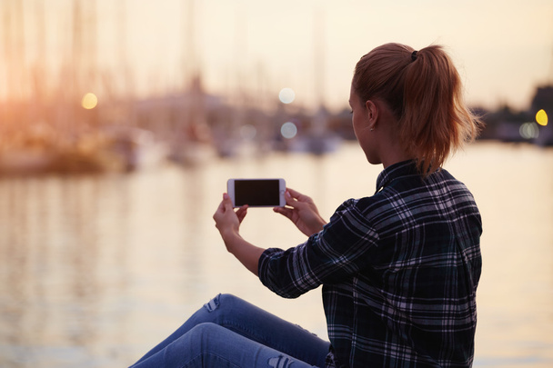 woman making photo with mobile phone - Foto, Imagem