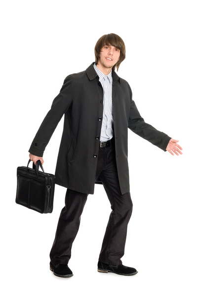 Young business man in a raincoat - Фото, зображення