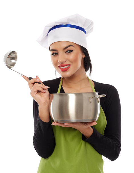 Woman chef with pot and ladle - Фото, изображение