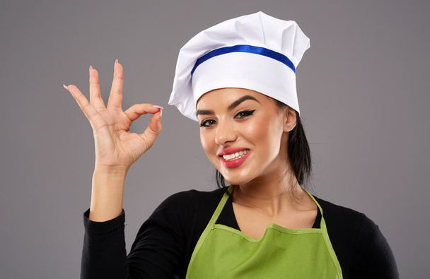 Woman chef making OK sign - Фото, зображення