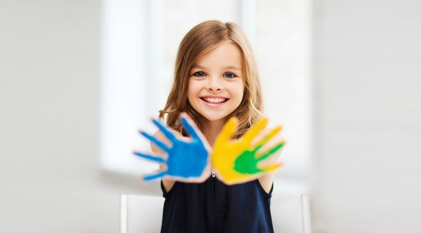 girl showing painted hands - 写真・画像