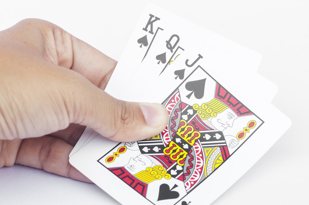 Játék kártyák a kezében elszigetelt fehér háttér - Fotó, kép