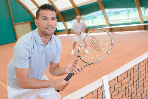 men in the tennis court - Foto, immagini