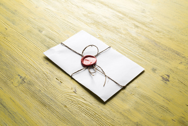 Letter with seal on table - Valokuva, kuva
